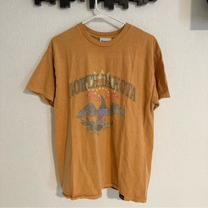 Vintage Supply north dakota collegiate t-shirt in mustard